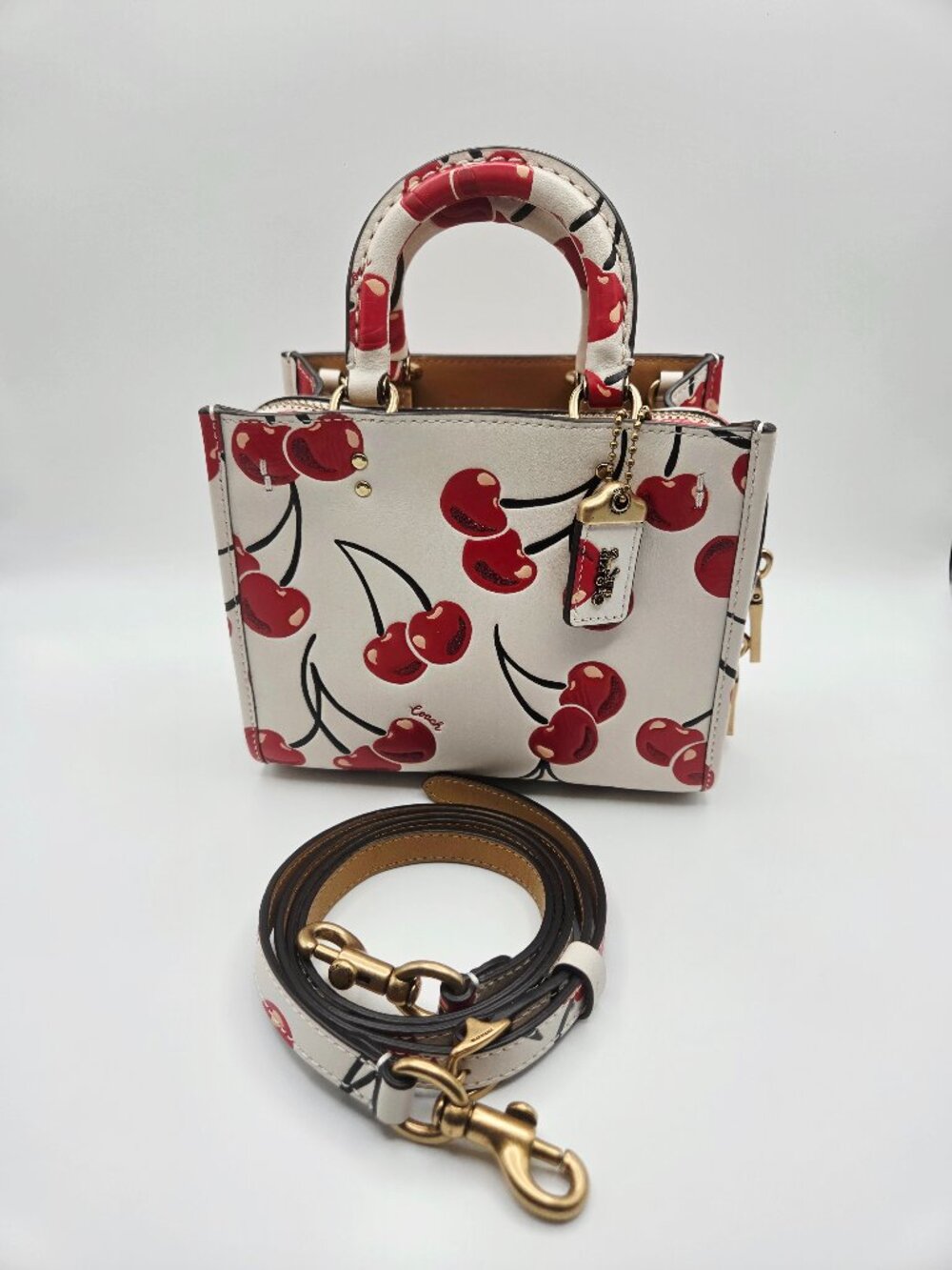 Coach Rogue with Cherry Print
